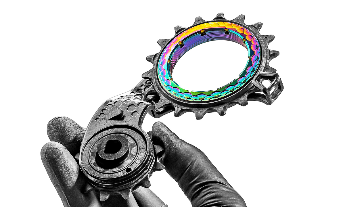 absoluteBLACK-HOLLOWcage-SRAM-AXS-aero-hollow-ceramic-derailleur-pulley-upgrade_rainbow-angled-2.jpg